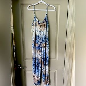 Jumper or Romper — never worn before. BRAND NEW